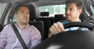 person in the car with passengers